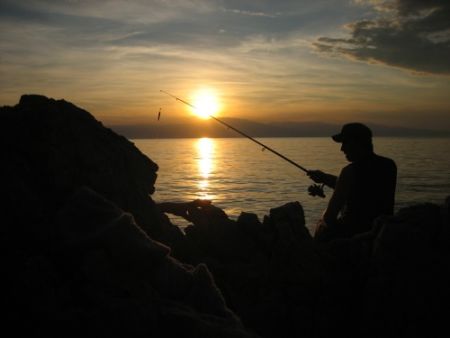 Angeln bei Sonnenuntergang